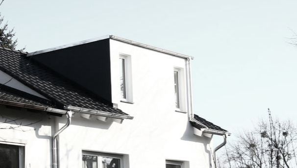 Dachausbau Wiesbaden — Gartenansicht